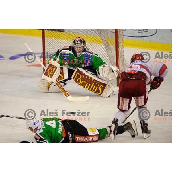 Jan Chabera, Robert Sabolic in action during Ice hockey match HDD Tilia Olimpija - Acroni Jesenice in 2nd game of the final of the Slovenian ice hockey league, Tivoli Hall, 03.04.2011 