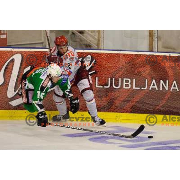 Ales Music, Robert Sabolic in action during Ice hockey match HDD Tilia Olimpija - Acroni Jesenice in 2nd game of the final of the Slovenian ice hockey league, Tivoli Hall, 03.04.2011 