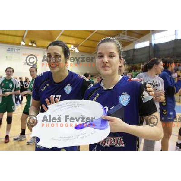 Players of Kirm Mercator celebrate victory at handball game Krim Mercator-Krka in the Final of Slovenian Cup, played in Zagorje on April 3, 2011 