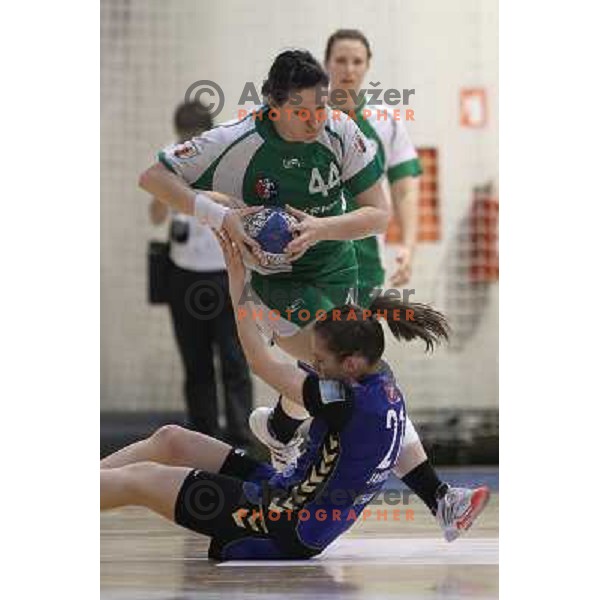 Tjasa Nadu of Krka and Alja Jankovic of Krim Mercator in action during handball game Krka-Krim Mercator in the final of Slovenian Cup, played in Zagorje, Slovenia on April 3, 2011. 