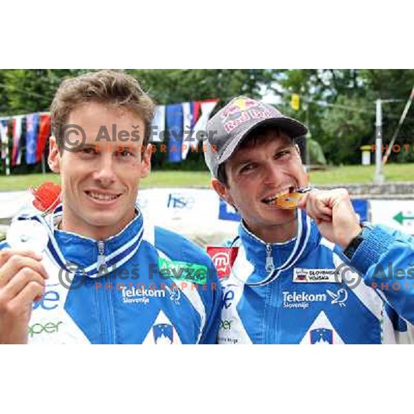 Jure Meglic (second place) and winner Peter Kauzer of Slovenia celebrate after ICF Canoe Slalom World Cup race SLOKA 2011 in Tacen, Ljubljana, Slovenia on June 25,2011 