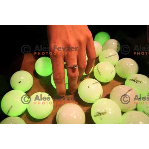 Night golf tournament with glowing golf balls at King\'s golf course at Bled, Slovenia on July 15, 2011 