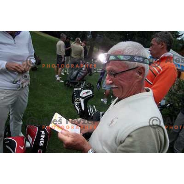 Night golf tournament with glowing golf balls at King\'s golf course at Bled, Slovenia on July 15, 2011 