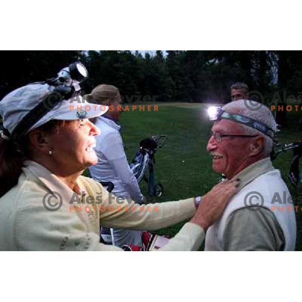 Night golf tournament with glowing golf balls at King\'s golf course at Bled, Slovenia on July 15, 2011 
