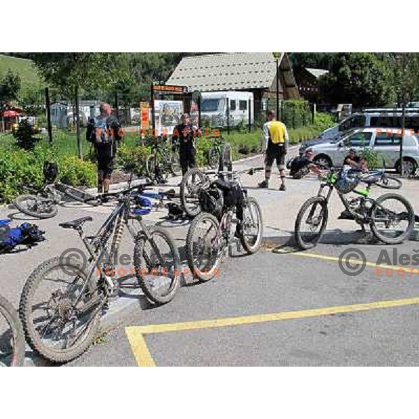 Loading of the free shuttle bus in Allemont which takes bikers to Oz Station gondola and to MTB park in Alpe d\'Huez ski resort, France on August 3, 2011 