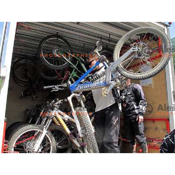 Loading of the free shuttle bus in Allemont which takes bikers to Oz Station gondola and to MTB park in Alpe d\'Huez ski resort, France on August 3, 2011 