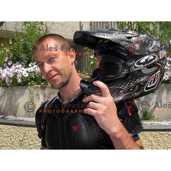 Matjaz Macek waiting for free shuttle bus in Allemont which takes bikers to Oz Station gondola and to MTB park in Alpe d\'Huez ski resort, France on August 3, 2011 