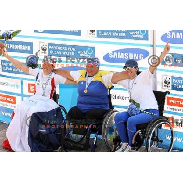 Benoit of France (second), Alla Lysenko of Ukraine, gold medalist and Samuel of Israel (bronze) in category ASW 1x of Disabled Rowers at 2011 World Rowing Championships at Bled, Slovenia on September 1,2011 