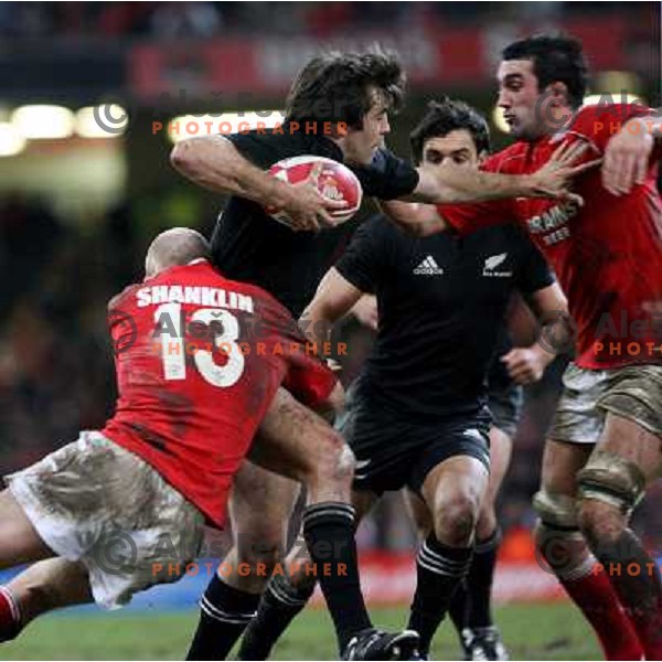 Conrad Smith running with the ball at rugby match between Wales and New Zealand at Millennium Stadium, Cardiff, Wales on November 25, 2006. New Zealand won 45:10