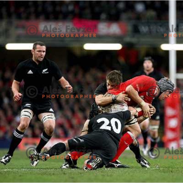 Piri Weepu tries to stop Alun Wyn Jones with the ball at rugby match between Wales and New Zealand at Millennium Stadium, Cardiff, Wales on November 25, 2006. New Zealand won 45:10