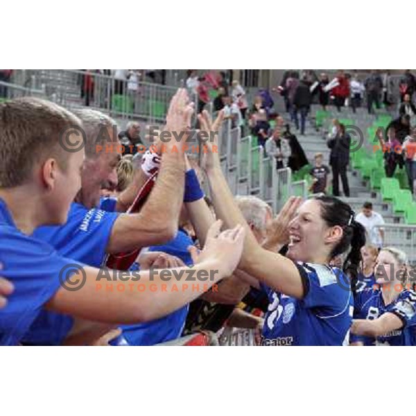 Players of Krim Mercator celebrate with their fans Krimovci during EHF Champions league regular season game 5 between Krim Mercator (Slovenia) and Podravka Vegeta (Croatia), played in Sports Hall Stozice, Ljubljana, Slovenia on November 5, 2011 