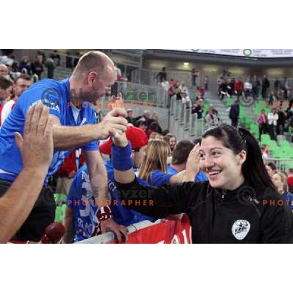 Players of Krim Mercator celebrate with their fans Krimovci during EHF Champions league regular season game 5 between Krim Mercator (Slovenia) and Podravka Vegeta (Croatia), played in Sports Hall Stozice, Ljubljana, Slovenia on November 5, 2011 