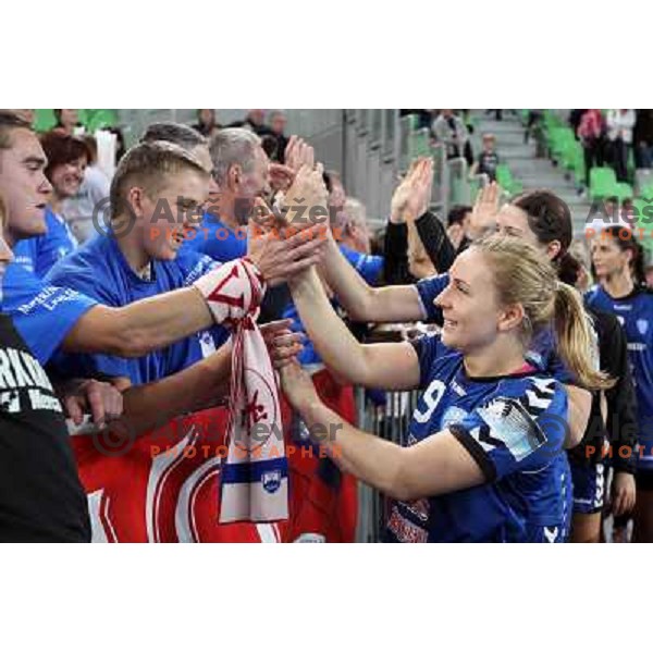 Players of Krim Mercator celebrate with their fans Krimovci during EHF Champions league regular season game 5 between Krim Mercator (Slovenia) and Podravka Vegeta (Croatia), played in Sports Hall Stozice, Ljubljana, Slovenia on November 5, 2011 