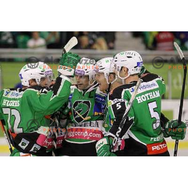 John Hughes, Ziga Pance, Jamie Fraser of Tilia Olimpija in action durnig EBEL league regular season game 2o between Tilia Olimpija and Red Bull Salzburg in Hala Tivoli, Ljubljana, Slovenia on November 6,2011 