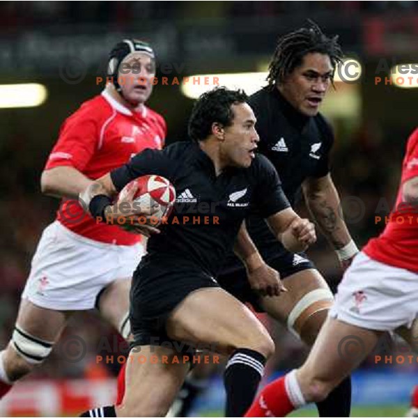 Rico Gear running with the ball at rugby match between Wales and New Zealand at Millennium Stadium, Cardiff, Wales on November 25, 2006. New Zealand won 45:10