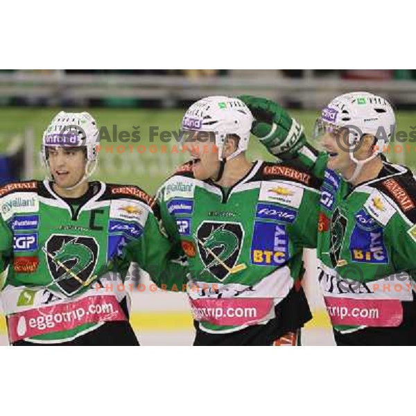 Ziga Pance, Jamie Fraser, Scott Hotham of Tilia Olimpija in action durnig EBEL league regular season game 2o between Tilia Olimpija and Red Bull Salzburg in Hala Tivoli, Ljubljana, Slovenia on November 6,2011 