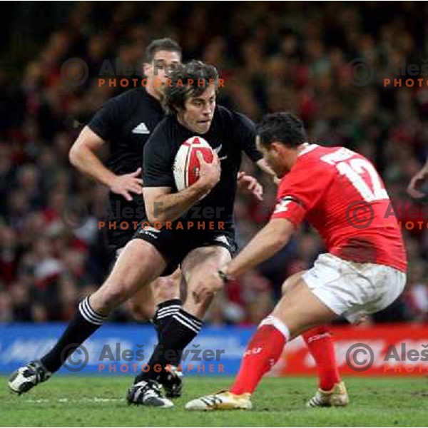 Conrad Smith vs Sonny Parker at rugby match between Wales and New Zealand at Millennium Stadium, Cardiff, Wales on November 25, 2006. New Zealand won 45:10