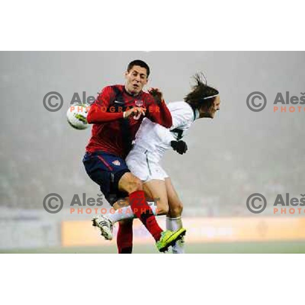 Clint Dempsey, Marko Suler in action during football game Slovenia - USA, Friendly match, Stozice, Ljubljana, 15.11.2011 