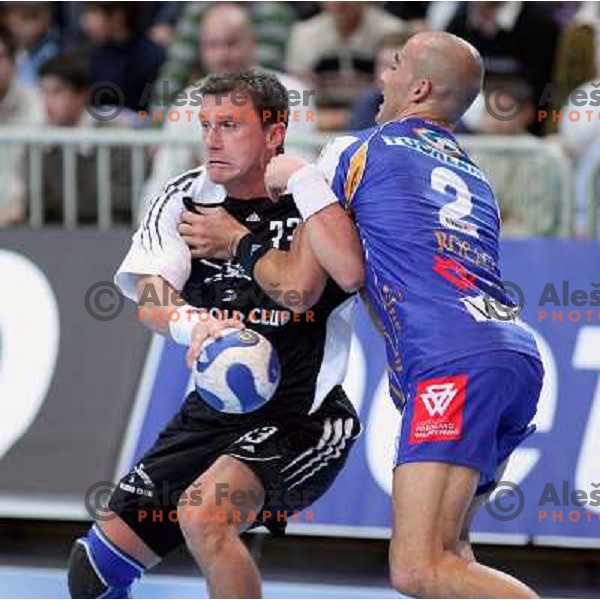 Albert Rocas tries to stop Zoran Jovicic