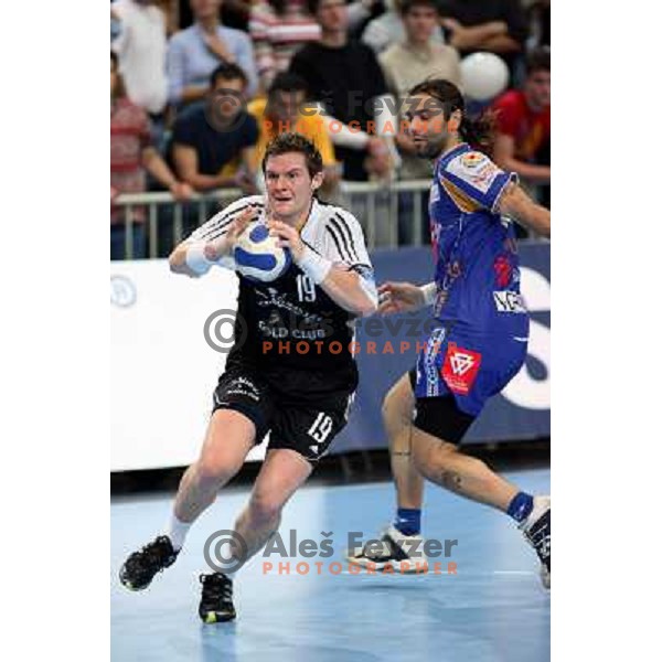 Konecnik drives past Balic