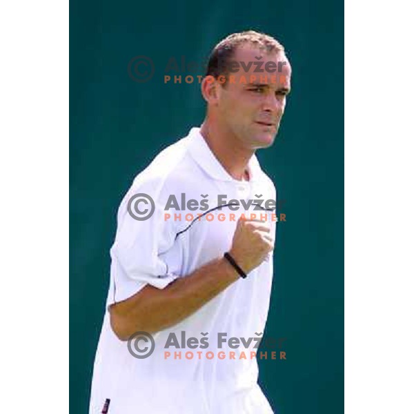 Marko Tkalec of Slovenia playing at tennis tournament, Mediteranean Games, Tunis, september 2001