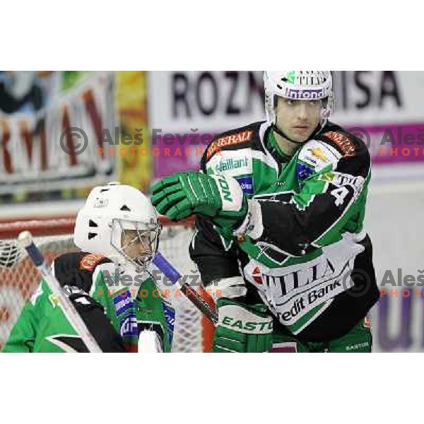 J.P. Lamoureux and Igor Cvetek of Tilia Olimpija in action during EBEL league regular season ice-hockey match in round 30 between HDD Tilia Olimpija Ljulbjana and KHL Medvescak Zagreb in Hala Tivoli, Ljubljana, Slovenia on December 9, 2011 
