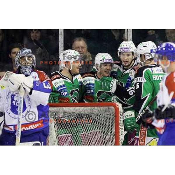 Jamie Fraser, Scott Hotham, John Hughes of Tilia Olimpija in action during EBEL league regular season ice-hockey match in round 30 between HDD Tilia Olimpija Ljulbjana and KHL Medvescak Zagreb in Hala Tivoli, Ljubljana, Slovenia on December 9, 2011 