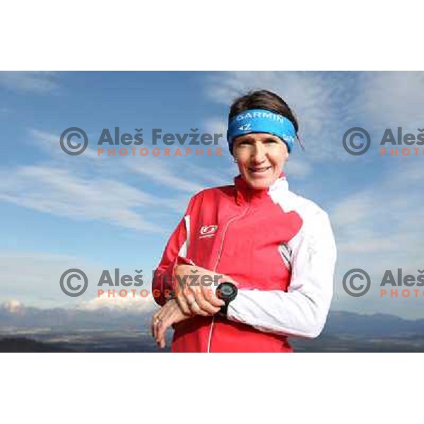 Anica Zivko of Slovenia, mountain runner from Celje during practice session with new Garmin Forerunner 610 in the hills near Kranj, Slovenia on December 6, 2011 