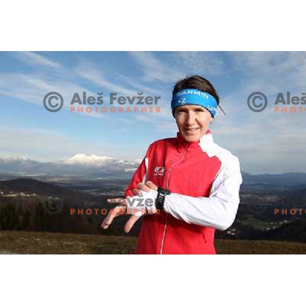 Anica Zivko of Slovenia, mountain runner from Celje during practice session with new Garmin Forerunner 610 in the hills near Kranj, Slovenia on December 6, 2011 