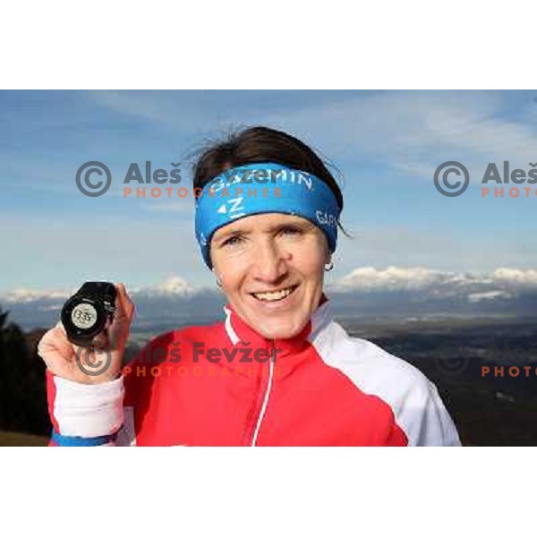 Anica Zivko of Slovenia, mountain runner from Celje during practice session with new Garmin Forerunner 610 in the hills near Kranj, Slovenia on December 6, 2011 