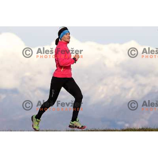 Anica Zivko of Slovenia, mountain runner from Celje during practice session with new Garmin Forerunner 610 in the hills near Kranj, Slovenia on December 6, 2011 