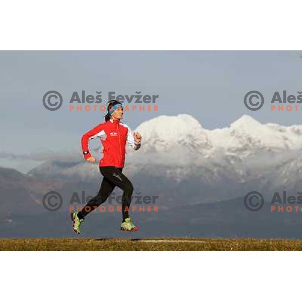 Anica Zivko of Slovenia, mountain runner from Celje during practice session with new Garmin Forerunner 610 in the hills near Kranj, Slovenia on December 6, 2011 