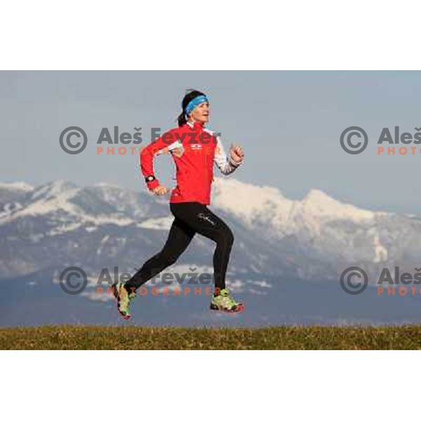 Anica Zivko of Slovenia, mountain runner from Celje during practice session with new Garmin Forerunner 610 in the hills near Kranj, Slovenia on December 6, 2011 