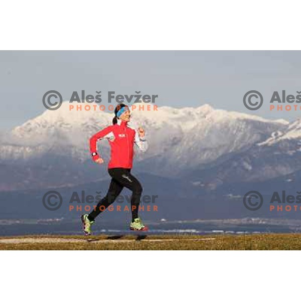 Anica Zivko of Slovenia, mountain runner from Celje during practice session with new Garmin Forerunner 610 in the hills near Kranj, Slovenia on December 6, 2011 