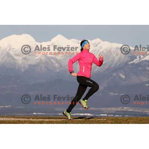 Anica Zivko of Slovenia, mountain runner from Celje during practice session with new Garmin Forerunner 610 in the hills near Kranj, Slovenia on December 6, 2011 
