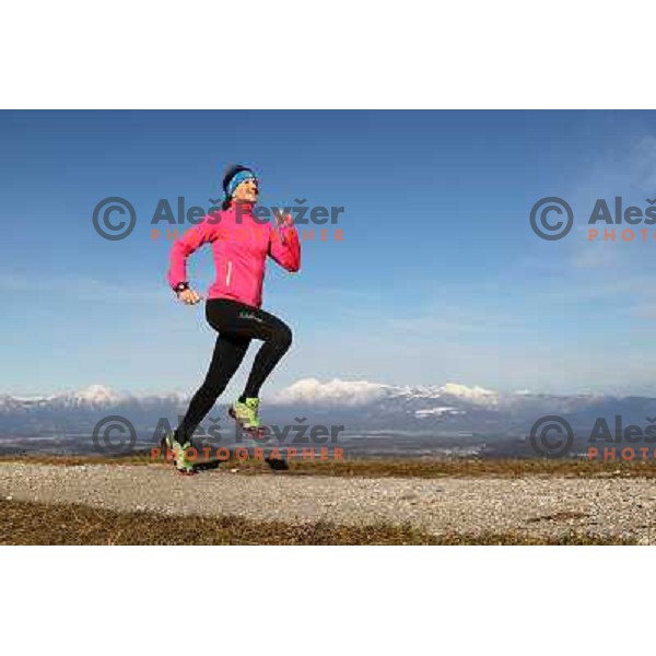 Anica Zivko of Slovenia, mountain runner from Celje during practice session with new Garmin Forerunner 610 in the hills near Kranj, Slovenia on December 6, 2011 