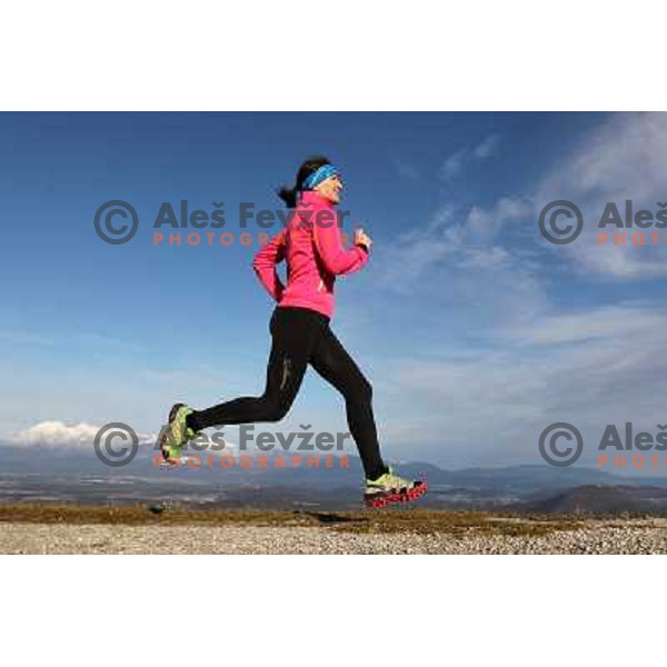 Anica Zivko of Slovenia, mountain runner from Celje during practice session with new Garmin Forerunner 610 in the hills near Kranj, Slovenia on December 6, 2011 