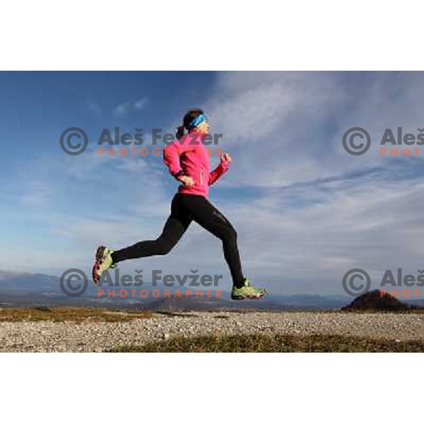 Anica Zivko of Slovenia, mountain runner from Celje during practice session with new Garmin Forerunner 610 in the hills near Kranj, Slovenia on December 6, 2011 