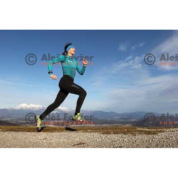 Anica Zivko of Slovenia, mountain runner from Celje during practice session with new Garmin Forerunner 610 in the hills near Kranj, Slovenia on December 6, 2011 