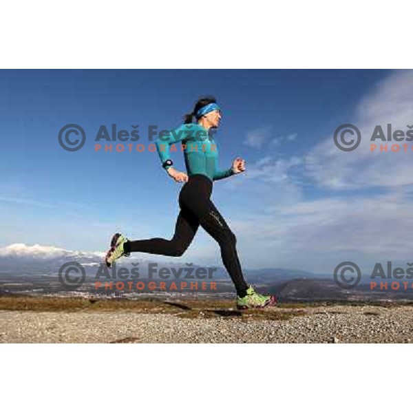 Anica Zivko of Slovenia, mountain runner from Celje during practice session with new Garmin Forerunner 610 in the hills near Kranj, Slovenia on December 6, 2011 