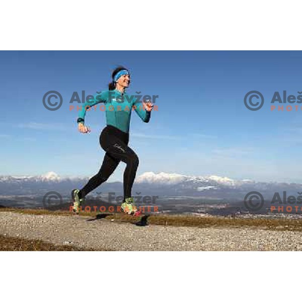 Anica Zivko of Slovenia, mountain runner from Celje during practice session with new Garmin Forerunner 610 in the hills near Kranj, Slovenia on December 6, 2011 