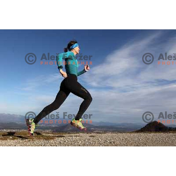 Anica Zivko of Slovenia, mountain runner from Celje during practice session with new Garmin Forerunner 610 in the hills near Kranj, Slovenia on December 6, 2011 