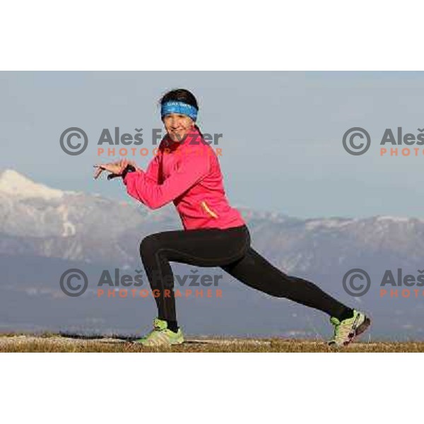 Anica Zivko of Slovenia, mountain runner from Celje during practice session with new Garmin Forerunner 610 in the hills near Kranj, Slovenia on December 6, 2011 