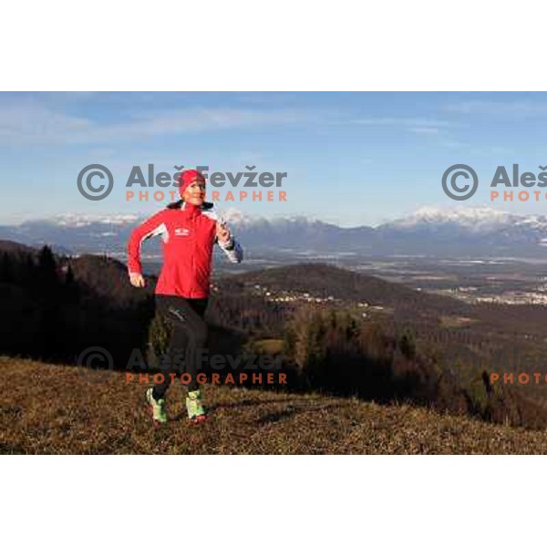 Anica Zivko of Slovenia, mountain runner from Celje during practice session with new Garmin Forerunner 610 in the hills near Kranj, Slovenia on December 6, 2011 