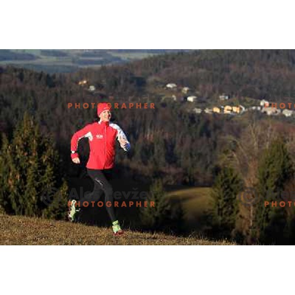 Anica Zivko of Slovenia, mountain runner from Celje during practice session with new Garmin Forerunner 610 in the hills near Kranj, Slovenia on December 6, 2011 