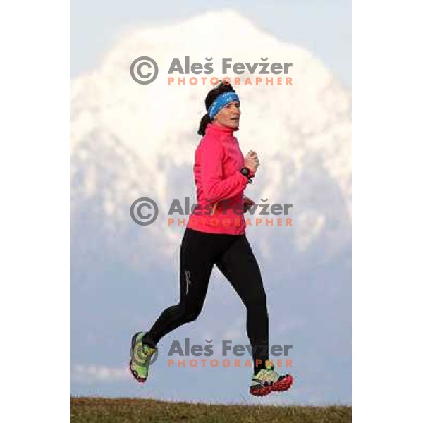 Anica Zivko of Slovenia, mountain runner from Celje during practice session with new Garmin Forerunner 610 in the hills near Kranj, Slovenia on December 6, 2011 