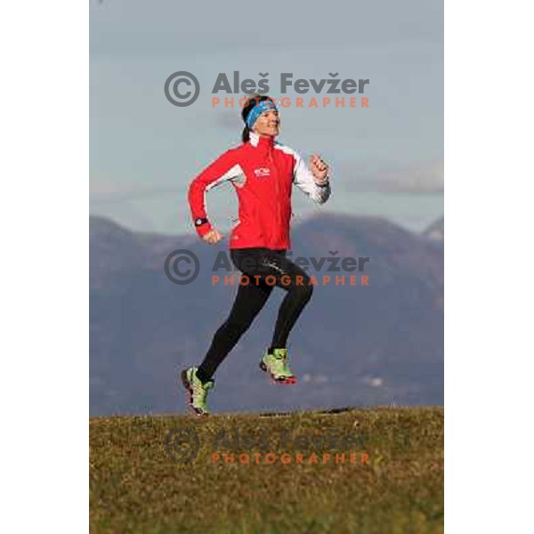 Anica Zivko of Slovenia, mountain runner from Celje during practice session with new Garmin Forerunner 610 in the hills near Kranj, Slovenia on December 6, 2011 
