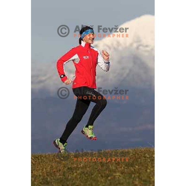 Anica Zivko of Slovenia, mountain runner from Celje during practice session with new Garmin Forerunner 610 in the hills near Kranj, Slovenia on December 6, 2011 