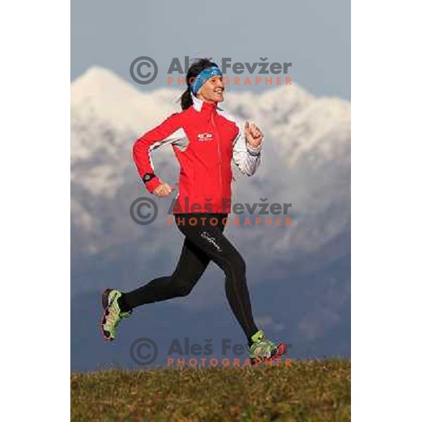 Anica Zivko of Slovenia, mountain runner from Celje during practice session with new Garmin Forerunner 610 in the hills near Kranj, Slovenia on December 6, 2011 