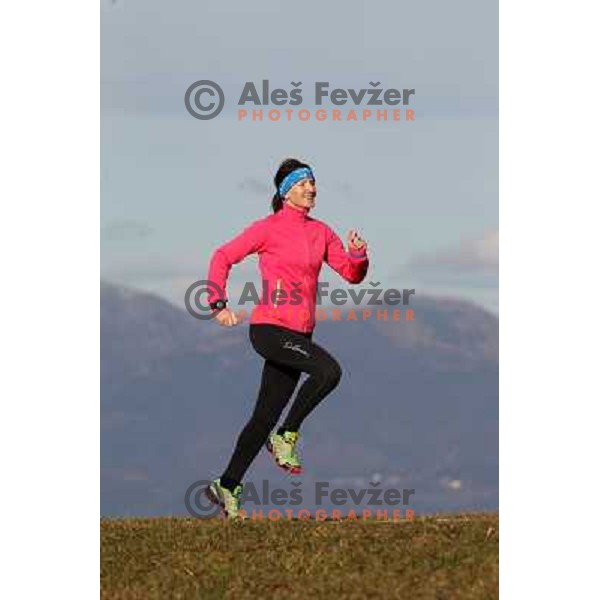 Anica Zivko of Slovenia, mountain runner from Celje during practice session with new Garmin Forerunner 610 in the hills near Kranj, Slovenia on December 6, 2011 